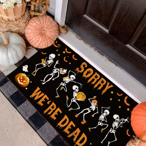 SORRY WE'RE DEAD SKELETON DOORMAT