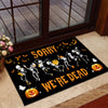 SORRY WE'RE DEAD SKELETON DOORMAT